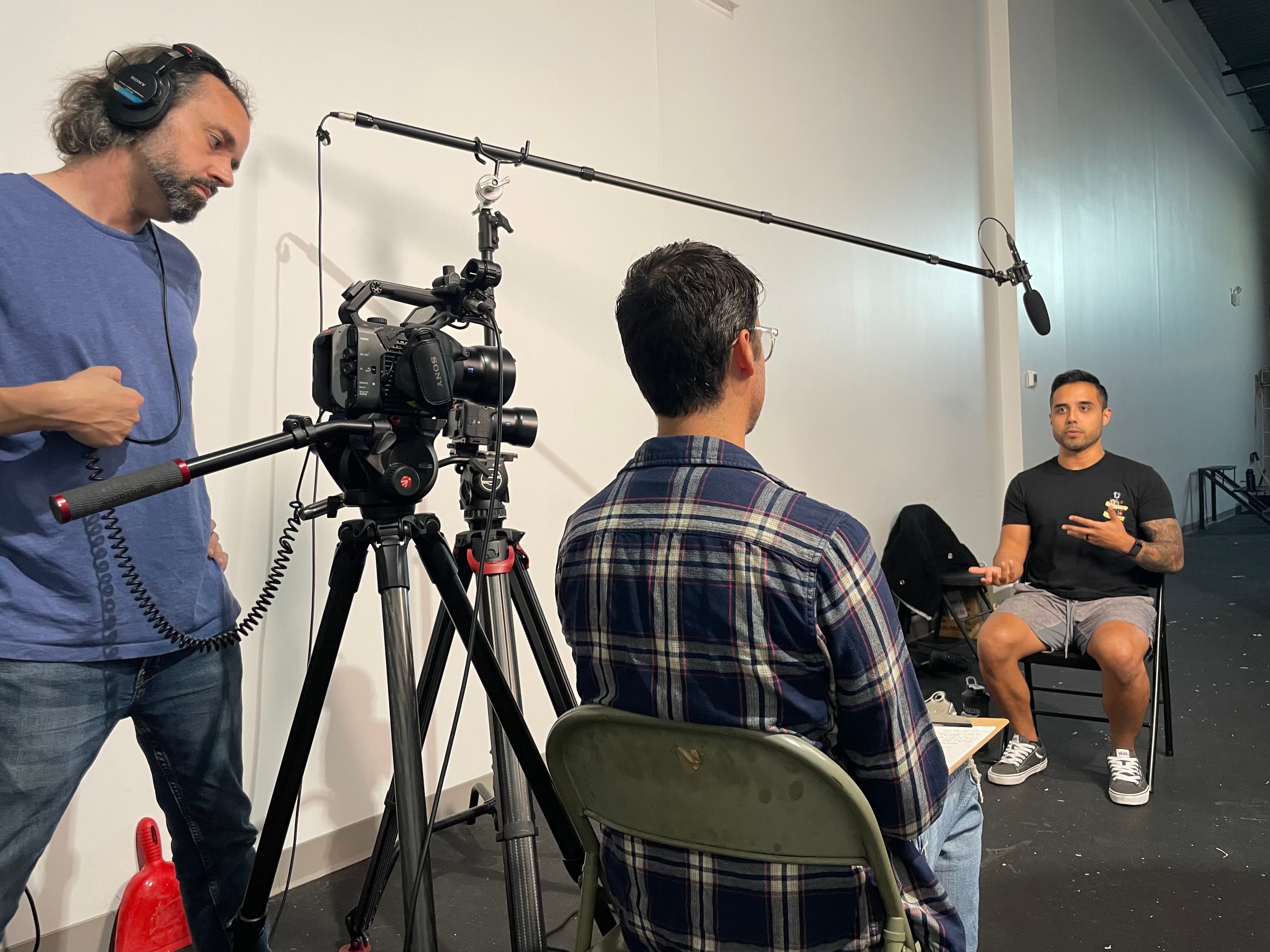 Cinematographer, producer and subject being interviewed on
camera